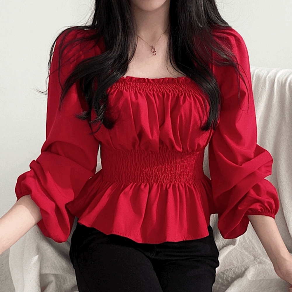 Red blouse with puffed long sleeves